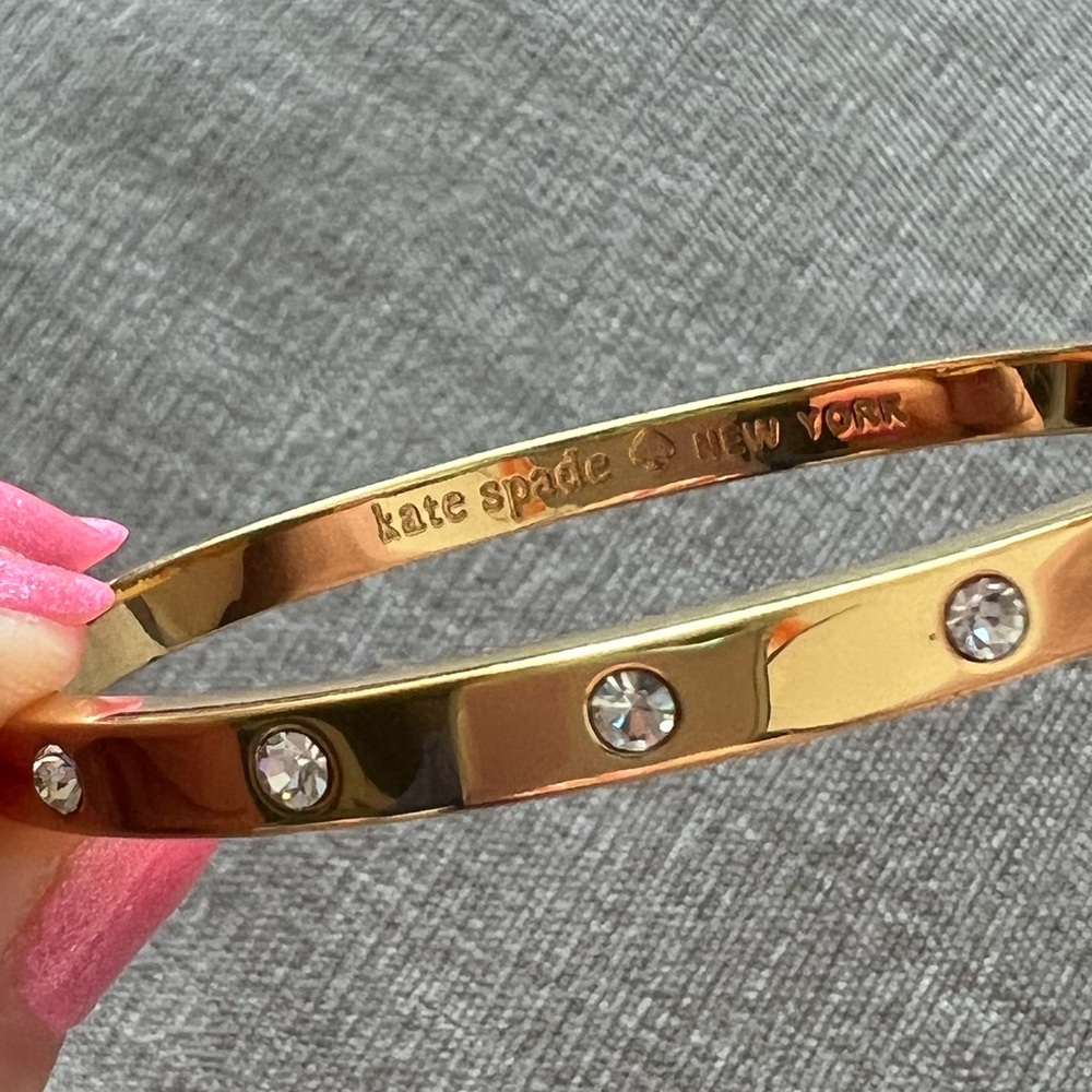 Kate Spade 18k gold plated bangle bracelet.